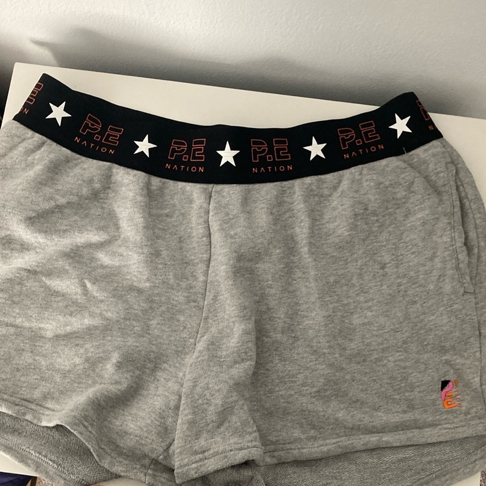 PE Nation shorts from PE nations H and M collar Size L new tried on never worn
